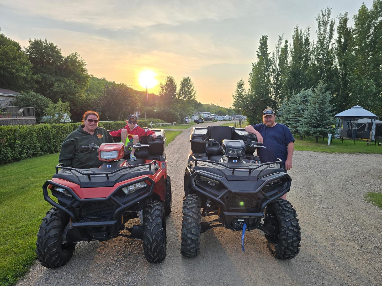 The Harrisons with their Polaris Sportsman 570s